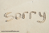 Sorry written on Beach sand