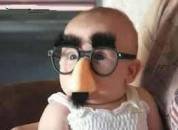 Baby With Funny Glasses